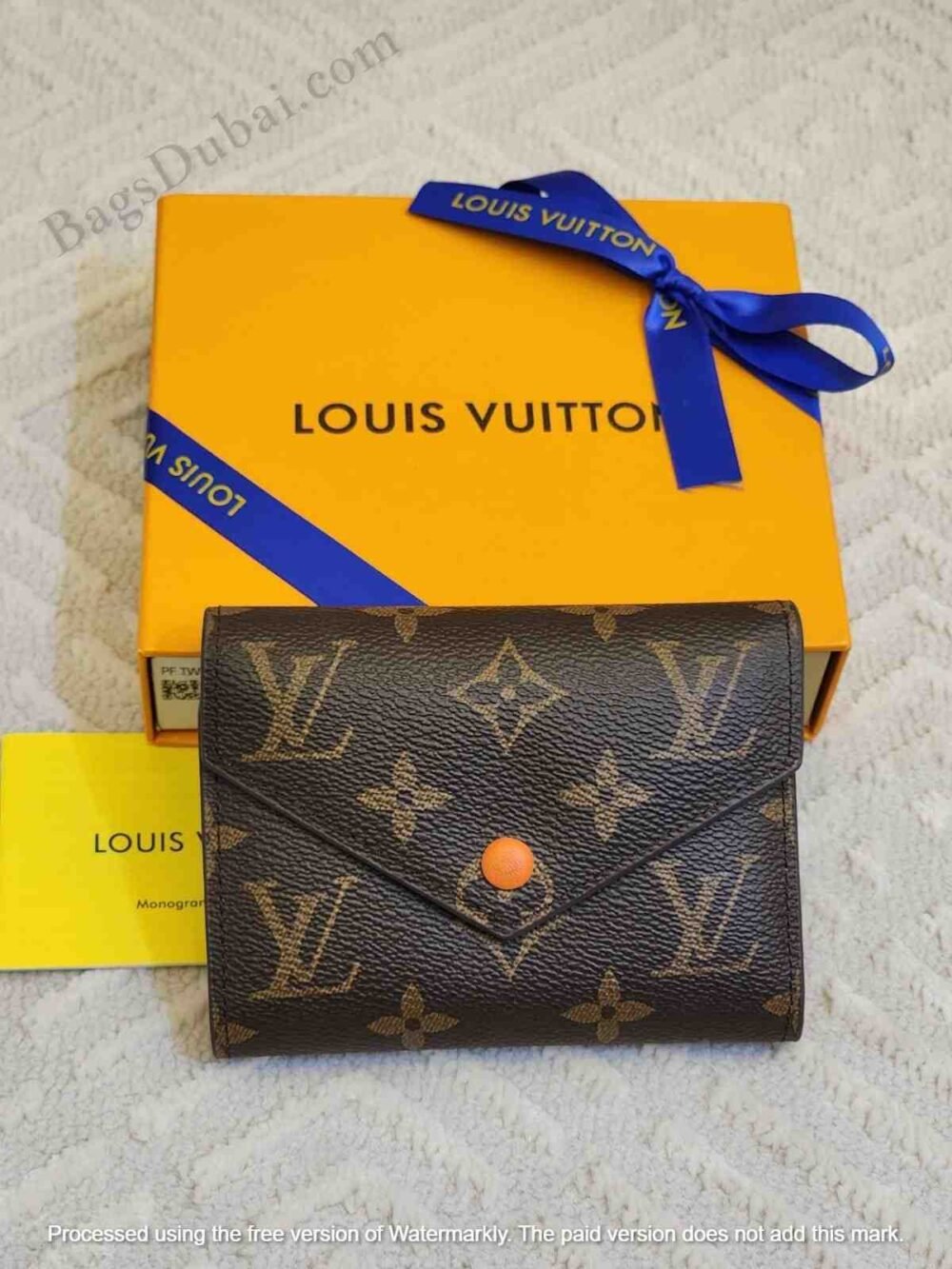 LV Victorine Wallet Fuchsia